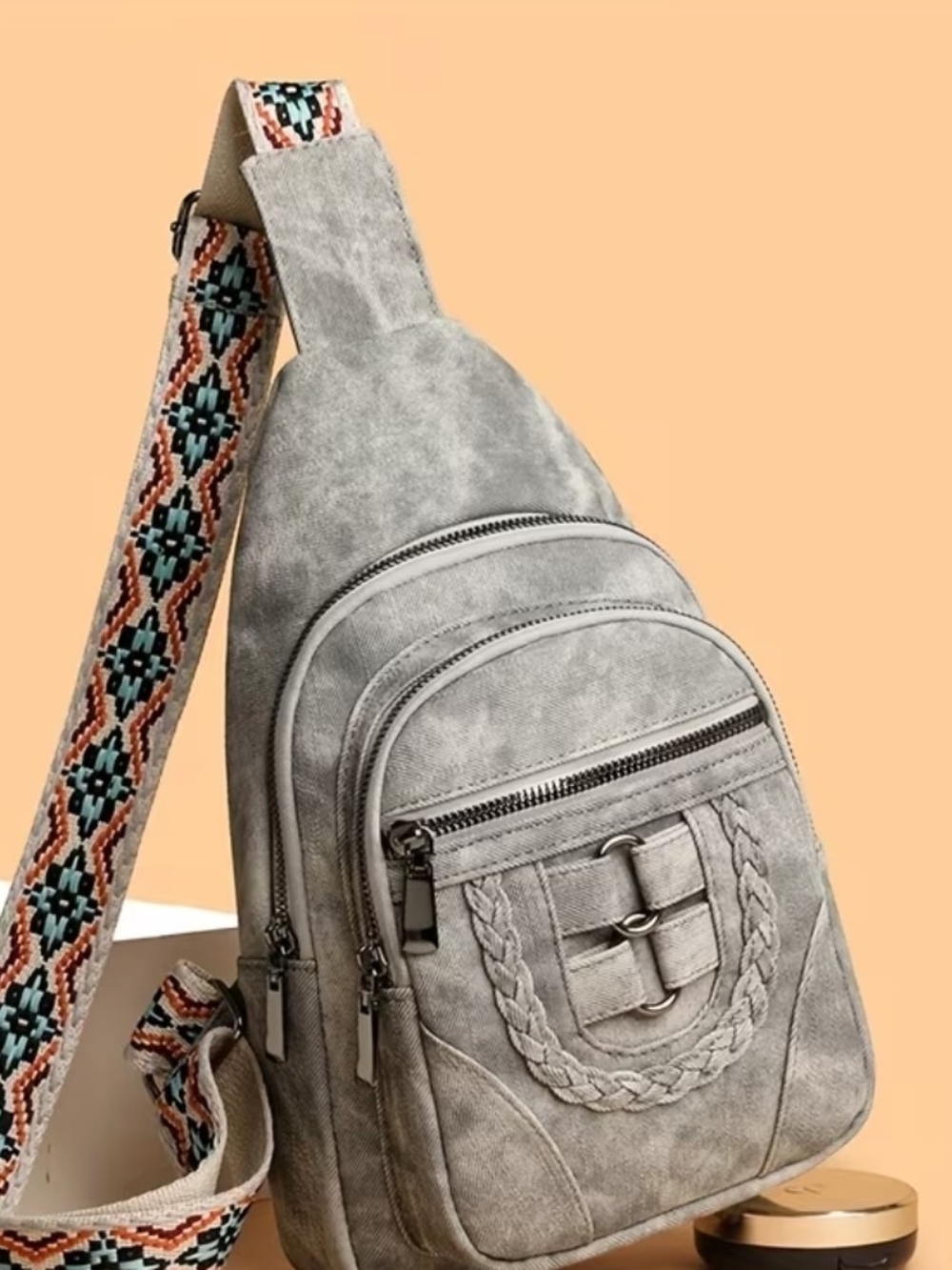 Gray Sling Backpack with Decorative Strap